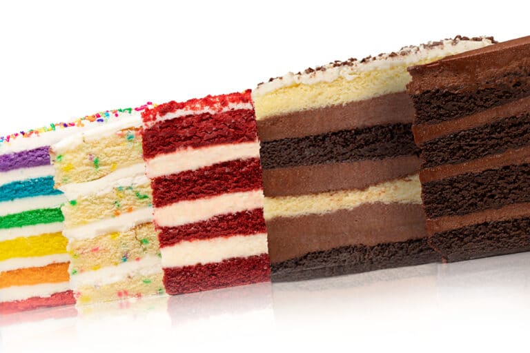 Five slices of cake arranged next to each other.